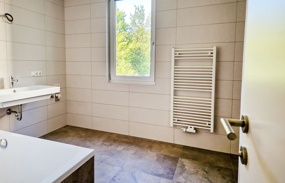 Neubau! Hochwertig ausgestattete 4-Zimmer-Wohnung im Grünen mit großer Süd-West-Terrasse – 9